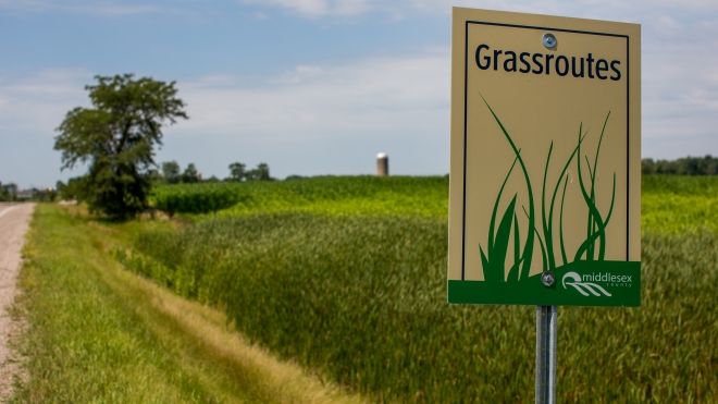 Discover Our Grassroutes sign 