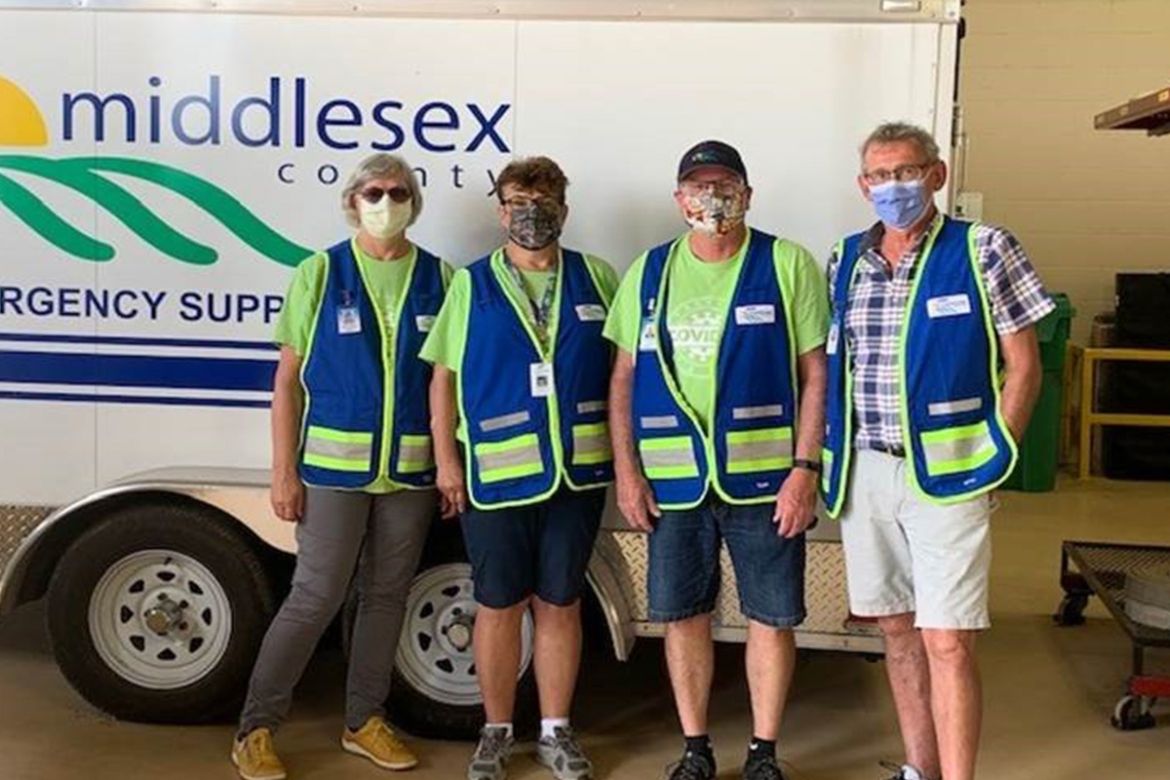 CERV Members in front of emergency trailer