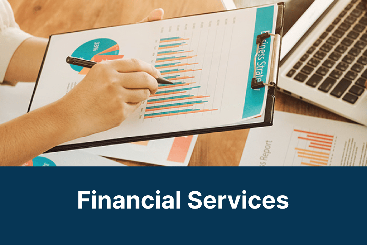 Image of a pie chart on a clipboard with text reading, &quot;Financial Services&quot;