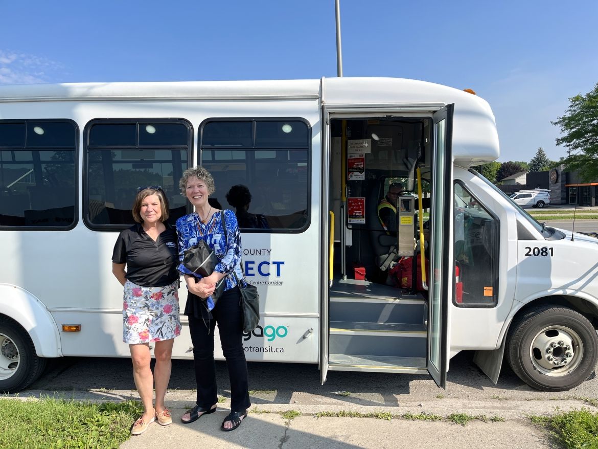 Warden Cathy Burghardt Jesson and Deputy Warden Aina DeViet in front of County Connect bus