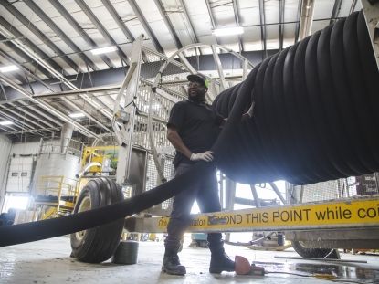 Man with industrial pipe 