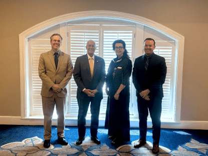 Middlesex County representatives pose for a photo with provincial representatives at AMO 2026.