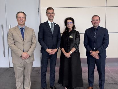 Middlesex County representatives pose for a photo with provincial representatives at AMO 2026.