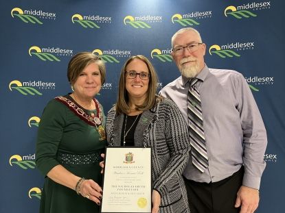 Warden Cathy Burghradt-Jesson and Denise and Dave Smith 