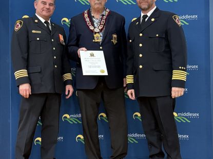 North Middlesex Fire Dept accepting award from Brian Ropp